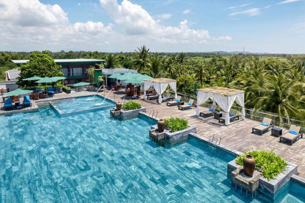 CocoLand Thu Xa Ancient Town Hotel & Resort